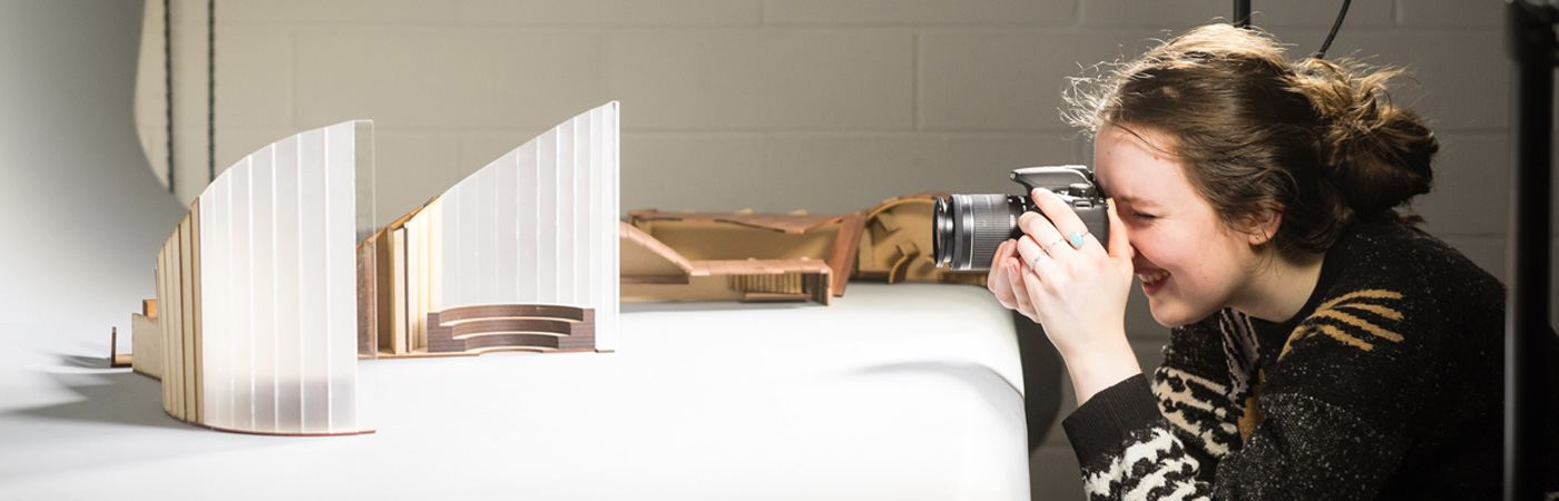 Architecture student photographing model