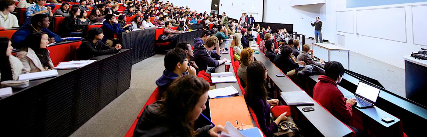 PlacehPeter Backus giving a lecture in University